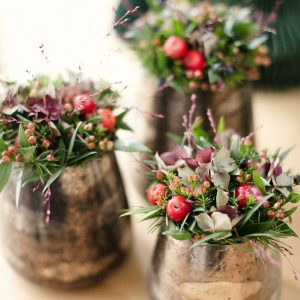Red seasonal table arrangements by Blue Lavender Florist London